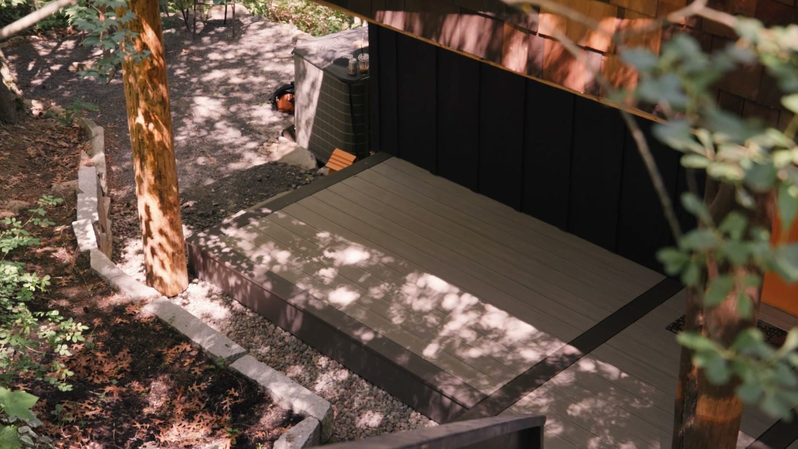 Composite deck with a modern privacy wall built by Honey Rock Construction in Coeur d'Alene, Idaho