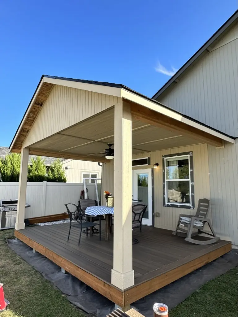 Backyard covered deck retreat built by Honey Rock Construction in North Idaho