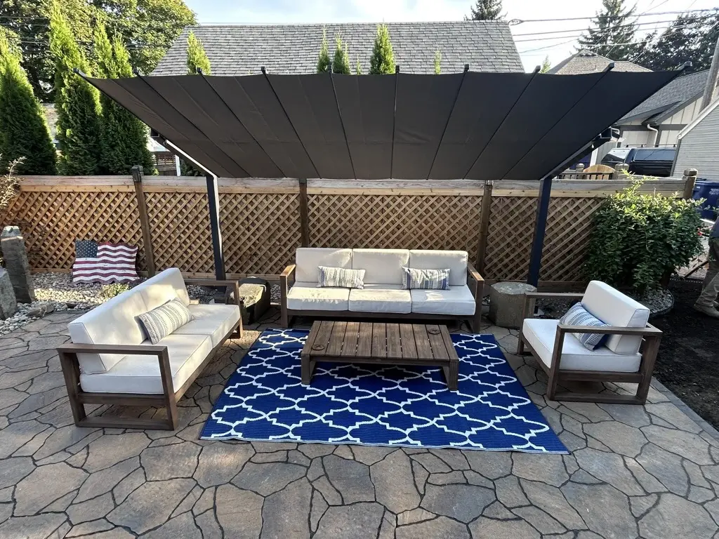 Outdoor living shade pavilion built by Honey Rock Construction in North Idaho